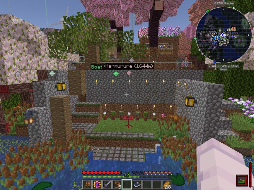 Original Minecraft screenshot of the waterfront coffee spot, cattails, lily pads, and stone terrace